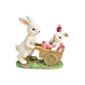 Prydnad kanin med barn i vagn