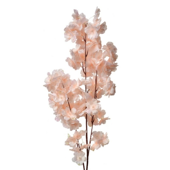 Konstkvist med persikofärgade blommor