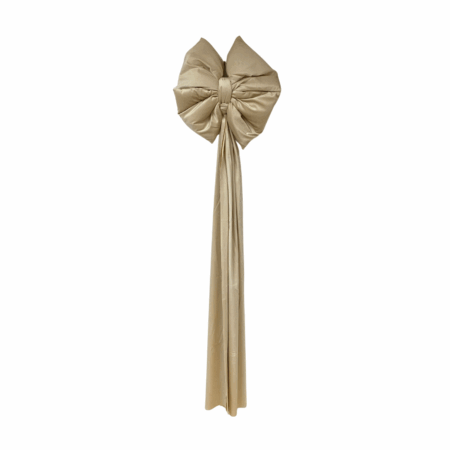 Stor rosett med långa svansar beige