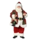 Tomte med rutig jacka och lykta