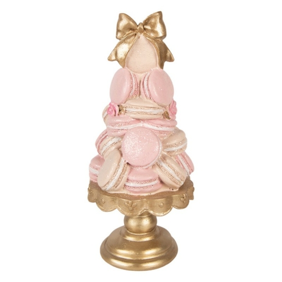 Rosa macarontårta på guldfat